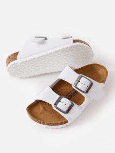 DESCRIPTION:Double-buckle sandal made from durable skin-friendly Birko-Flor® material.FEATURES:Round ToeAdjustable Double-Buckle ClosureUpper: Synthetic Birko-Flor®Anatomically Shaped Cork & Latex FootbedFootbed Lining: SuedeSole: EVARegular Fit Buckle Sandals, Birkenstock Arizona, Saint Bernard, Birkenstock, Cork, Arizona, Buckle, Sandals, Skin