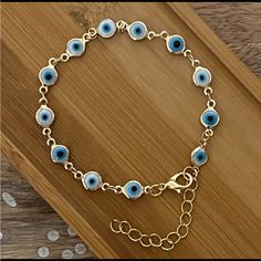 New Cool White & Blue Glass Chain Link Evil Eye Bracelet. Bracelet Is 7 Inches Long With 2 Inch Extension. Blue Adjustable Chain Bracelet, Adjustable Nickel-free Blue Chain Bracelet, Adjustable Blue Metal Chain Bracelet, Adjustable Blue Nickel-free Chain Bracelet, Blue Metal Bracelets With Evil Eye, Adjustable Blue Evil Eye Bracelet Nickel Free, Adjustable Nickel-free Blue Evil Eye Bracelet, Adjustable Blue Evil Eye Bracelet, Nickel Free, Blue Metal Bracelet With Evil Eye