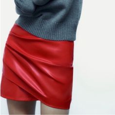 Absolutely Beautiful True Red Color, Concealed Zipper, Wrap Style With Ruching To Front Outer Shell Base Fabric 100% Polyester Coating 100% Polyurethane Winter Faux Leather Skirt, Chic Faux Leather Mini Skirt For Winter, Trendy Red Winter Skirt, Trendy Red Skirt For Workwear, Trendy Red Skirt For Work, Red Mini Skirt For Workwear In Fall, Trendy Red Mini Skirt For Work, Red Mini Skirt For Fall Workwear, Red Mini Skirt For Party In Winter