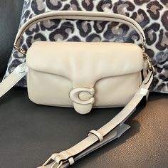 Coach Pillow Tabby 26 Nwt Ivory Designer Rectangular Cream Shoulder Bag, Designer Cream Rectangular Shoulder Bag, Chic Cream Coach Shoulder Bag, Luxury Neutral Crossbody Shoulder Bag, Designer Cream Satchel Bag, Chic Cream Coach Bag, Chic Beige Coach Shoulder Bag, Designer Cream Bag With Detachable Strap, Designer Cream Crossbody Shoulder Bag