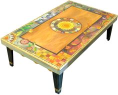 an artisticly designed coffee table with colorful designs on the top and bottom, sitting in front of a white background