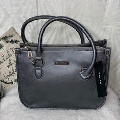 Tahari | Stardust Gray Handbag Color : Silver Gray Has A Magnetic Snap Closer With 2 Zipper Pouch Pocket On Each Side Middle Closer Has A Zipper Pocket Inside Back 2 Pockets Inside Front Very Wide Bottom To Hold A Lot Of Your Items Double Handle Strap Drop 4.75 12” X 9.5” Nwt >Smoke Free House >Thank You For Checking Out My Listings >Have A Beautiful Day!! >Xp > Shipped Within 1 -3 Business Days Gray Handbags, Have A Beautiful Day, A Beautiful Day, Home Free, Stardust, Zipper Pouch, Beautiful Day, Pocket Pouch, Inside Pocket