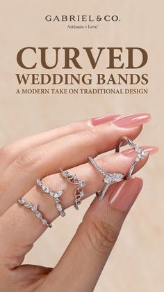 a woman's hand holding five rings with the words curved wedding bands on it