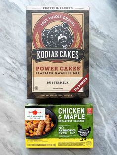 two boxes of kodiak cakes next to each other on a marble counter top