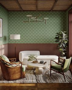 a living room with green wallpaper and white furniture in the center, along with two wicker chairs