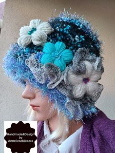 "The color of the hat is blue ,white and black. Hand crocheted flowers sewn on the hat plus a ruffle from efect-yarn. This HAT is UNIQUE like all my products. Hat fits for a head circumference of - 56-58 cm / 22,04 - 22,83 \" The color of the product in the photo may differ from the real one due to the color settings of your monitor. Recommendations for care: gentle hand washing at temperatures up to 30 degrees or cold , drying on a large cup. Thank you for visiting my store  Have a great day!" Blue Knitted Hat For Spring, Blue Hand Knitted Hats For Spring, Blue One-size Spring Crochet Hat, Brimmed Blue Mini Hats For Winter, Blue Brimmed Hat For Winter, Whimsical Brimmed Yarn Hats, Blue Bohemian Yarn Hat, Blue Brimmed Winter Hat, Bohemian Blue Hand-knitted Crochet Hat