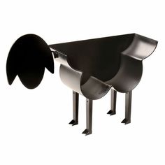 two metal sculptures with black and white shapes