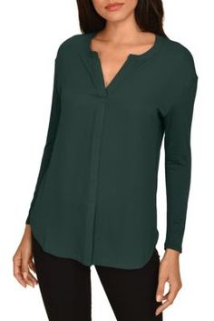 The Taylor blouse is a timeless top that will be your all time favorite. The simple silohuette paired with the bold colors can be dressed up or down to match any occasion. | DR2 by Daniel Rainn Women's Split Neck Casual Top, Large Versatile Solid Color Long Sleeve Top For Work, Versatile Solid Long Sleeve Top For Work, Versatile Long Sleeve Top For Work, Trendy Solid Color Long Sleeve Top For Work, Trendy Solid Long Sleeve Top For Work, Trendy Long Sleeve Top For Work, Classic Green V-neck Top, Classic Green Office Tops, Green Tops For Workwear