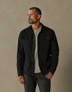 Crisp and structured. This shirt jacket is constructed from 100% Cotton canvas. It achieves an effortlessly rugged look with triple needle stitching for durability and a relaxed fit, great for layering. The jacket also includes two chest pockets with flaps, a shirt collar, a front button placket, a back yoke with a box pleat, elbow panels, sleeve cuffs with plackets, and a flattering shirttail hem. Black Overshirt Men Outfit, Black Shacket, Overshirt Women, Fall Color Trend, Rugged Look, Workwear Jacket, Mens Fashion Casual Outfits, Everyday Dresses, Outerwear Sweater