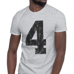 Elevate your style with our Softstyle Gildan T-shirt, proudly displaying your favorite number on the front with a distressed worn look. Crafted for comfort and lasting quality, this tee adds a unique, sporty touch to your look. Unleash your lucky side with this iconic design! This adult t-shirt is made for men and women. * White is 100% ring-spun cotton * Sport Grey is 90% ringspun cotton, 10% polyester * Shoulder-to-shoulder taping Casual Sports T-shirt With Number Print, Sports Fan T-shirt With Number Print And Crew Neck, Sports Fan T-shirt With Text Print For Streetwear, Sporty Number Print T-shirt For Streetwear, Sports Season Fan Apparel Tops With Number Print, Number Print Short Sleeve T-shirt For Streetwear, Casual Number Print T-shirt For Fan Merchandise, Sporty Tri-blend T-shirt With Letter Print, Casual Number Print T-shirt For Fans