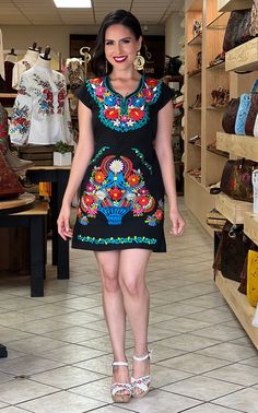 -This Beautiful Mexican Colorful Floral Dress is the perfect dress for a fun night out or a special event. -It's made out of cotton and is full of colorful embroidered details. Size S - 3X Please note: Machine Embroidered- hand manipulated. Embroidery will vary on each unique dress. The earrings you can buy too and find here https://www.etsy.com/es/listing/637147293/filigrana-redonda-filigrana-clasica?ref=shop_home_active_1&pro=1&frs=1 Fitted V-neck Dress With Embroidered Neckline, Embroidered Multicolor V-neck Dress, Fitted Mini Dress With Multicolor Embroidery, Multicolor Embroidery Short Sleeve Party Dresses, Fitted Embroidered Dress With V-neck, Multicolor Embroidered Short Sleeve Dress For Party, Short Sleeve Embroidered Dress With Multicolor Embroidery For Party, Short Sleeve Embroidered Dress For Party, Party Dress With Multicolor Embroidery And Short Sleeves