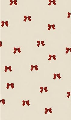 an image of red bows on a white wallpaper background that looks like something out of the movie it's about to happen