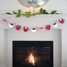 a fireplace decorated with tea cups and candles