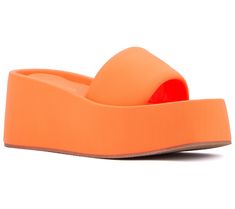 Slide into the season with the Uproar wedge sandal, where comfort meets effortless style. This chic sandal, featuring a padded footbed and upper along with a modern square-toe design, offers an updated take on the classic slide silhouette. Perfect for sunny days and warm evenings, it's an essential addition to your spring and summer wardrobe. From Olivia Miller. Comfortable Summer Slides With Wedge Heel, Trendy Summer Platform Slippers With Heel Loop, Summer Platform Slide Slippers, Summer Synthetic Platform Slippers With Heel Loop, Synthetic Slide Wedge Sandals For Summer, Summer Platform Slippers With Textured Footbed And Wedge Heel, Spring Beach Platform Slippers With Heel Loop, Spring Slide Wedge Sandals With Textured Footbed, Modern Summer Platform Slippers With Open Toe