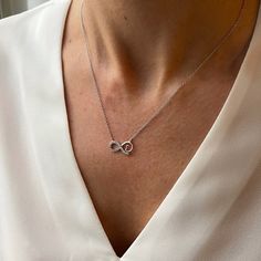 Metal: 925 Sterling silver, 18k yellow or rose gold vermeil. Dimensions of the Infinity: 15mm * 10mm Length of necklace: 40cm + 3cm extension (16" + 1.2" extension). %100 HANDMADE & 925 SILVER A delicate and minimalist 18k gold vermeil necklace. The necklace is 925 Sterling Silver and all the sparkly stones on this gorgeous necklace are cubic zirconia. This beautiful necklace is available in three different colours and comes with a special jewellery box. It is perfect for every day wear and also Elegant Rose Gold Infinity Necklace, Sterling Silver Infinity Necklace In White Gold, Dainty Infinity Rose Gold Necklace, Dainty Rose Gold Infinity Necklace, Cubic Zirconia Infinity Necklace For Anniversary, White Gold Infinity Jewelry For Anniversary, Anniversary Infinity Necklace With Delicate Chain, White Gold Infinity Jewelry For Formal Occasion, White Gold Infinity Necklace With Cubic Zirconia