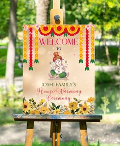 a welcome sign is on an easel in front of some trees and grass with the words, welcome to joseph family's peace warming evening