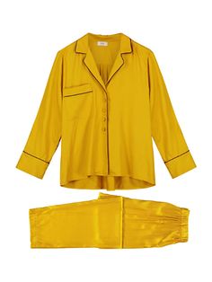 Luxurious silk pyjama set in a brilliant yellow hue. Tailored from soft bamboo silk, the loungewear is classic in style, with a slightly oversized top and elasticated waistband for comfort. Slim piping detail add to the sophistication, whilst a front chest pocket (top) and two side pockets (bottoms) add functionality. Take the look to the next level with the designer’s matching silk robe. Silk Pyjama Set, Yellow Pajamas, Yellow Bamboo, Silk Pajama Set, Silk Robe, Bamboo Silk, Silk Pajamas, Oversized Top, The Bedroom