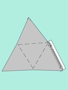 an image of a paper triangle on a blue background