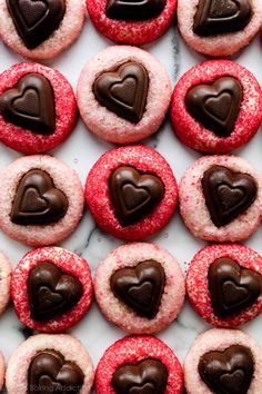 valentine's day cookies with chocolate hearts on top