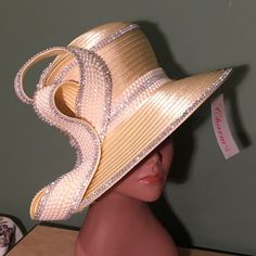 Dazzling ! This Is The Kind Of Buttercream Yellow Hat That Will Command Attention When You Enter The Room. It Has Gleaming Sparkling Rhinestones & Pearls On It. 22.5”-22.75” Inside Measure With Drawstring For Fit. Final Sale! Elegant Summer Hats With Rhinestones, Elegant Evening Hats With Rhinestones, Elegant Wide Brim Hat With Rhinestones, Evening Hats With Rhinestones And Curved Brim, Elegant Rhinestone Hat For Spring, Elegant Embellished Hats With Curved Brim, Fitted Hat With Rhinestones And Short Brim, Elegant Embellished Hat With Curved Brim, Fitted Hats With Rhinestones And Short Brim