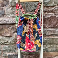 Unique, Vintage Handcrafted Drawstring Satchel Backpack Bags From India. Recycled Saris Are Hand Stitched In Traditional Kantha Quilting. One Of A Kind Vibrant Patterns Braided Tasseled Drawstring Closure + Interior Pocket H: 12” In. W: 18” In. Bag Length W/ Strap: 24” In Gusset :10” In Boho Ethnic Shoulder Market Free People Anthropologie Urban Outfitters Festival Beach Travel Floral Hippie Gypsy Yoga Paisley Roomy Tote Crossbody Purse Carryall Handbag Carry Shopping Rucksack Kantha Monkey Bags, Kantha Quilting, Monkey Bag, Kantha Sari, Boho Backpack, Boho Crossbody Bag, Satchel Backpack, Vibrant Patterns, Vintage Kantha