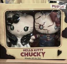 hello kitty and chucky dolls in a box