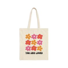 Reminder: You Are Loved. Not Negotiable. This 100% cotton bag comes in one size - 15" x 16"- perfect for everyday wear. It's  durable and will last for years. The bag features 20" handles (made from the same canvas), making it easy to carry even with a week's worth of shopping. Pink Retro Vibes Tote | Nature Lover Tote | 70s Pink Cotton Tote | Groovy Floral Tote Bag | Summer Tote | Preppy Princess Lover Gifts | Cute Uni Bag | Groovy Hippy Vibes | Teen Tote | Flower Power Aesthetic Gift | Trendy Retro Pink Cotton Bag, Everyday Retro Canvas Bag With Letter Print, Retro Canvas Tote Bag With Graphic Print, Retro Everyday Canvas Bag With Letter Print, Retro Graphic Print Canvas Tote Bag, White Retro Canvas Bag For Summer, Retro Graphic Print Canvas Bag For Daily Use, Retro Cotton Bags For Spring, Retro White Canvas Bag For Summer