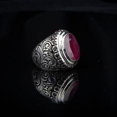 Ruby Silver Ring, Gift For Him Material: 925 Sterling Silver Stone Type: Ruby Stone Dimensions: 22 x 19 mm Average Weight: 27 gr. (depends on your ring size)  Shipping via DHL Express by The Grand Bazaar Istanbul. Delivery Takes 1-3 days to any worldwide location. Shipping is free of charge. FOR MORE HANDMADE JEWELRY VISIT: https://www.etsy.com/shop/GrandBazaarExclusive Luxury Silver Ruby Ring, Engraved Silver Ruby Ring For Anniversary, Handmade Luxury Sterling Silver Ruby Ring, Luxury Silver Ruby Ring With Stone Setting, Engraved Round Ruby Ring Luxury Style, Engraved Sterling Silver Ruby Ring, Luxury Engraved Round Ruby Ring, Anniversary Ruby Rings Engraved, Anniversary Engraved Ruby Rings