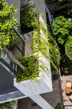 an overhead view of a building with plants growing on it