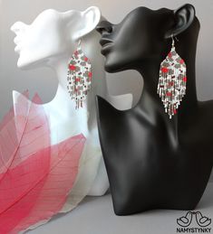 These floral beaded earrings are made of high-quality Czech beads and strong synthetic thread. They are elegant, fashionable, and highly versatile, suitable for everyday wear. Features: Sterling silver components Color: white, gray, red, brown Length (approximate): 9,5 cm (3.74 in) This item is currently in stock. You must be completely satisfied. If you find merchandise unsatisfactory for any reason, return it within 10 days and your money will be refunded without questions. More beaded earring Elegant White Chandelier Earrings With Colorful Beads, Silver Chandelier Earrings With Colorful Beads As Gift, White Silver Beaded Drop Earrings, White Earrings With Silver Beads For Gift, Blue Beaded Earrings, Beaded Earrings Native, Native American Earrings, Indian Earrings, Red Earrings