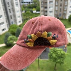 🌼🌼 All the flowers on the hat have been hand-embroidered, and each design is unique. These hats will shield you from the summer sun's heat and serve as the perfect complement to your outfits. ------------------------------------------------------------- Color: Orange Design: hand embroidered with wildlowers Cap size (head circumference): 55 - 67 cm; Fabric: 100% cotton - Cotton threads This hat comes in a one-size-fits-all design with an adjustable back. You have the flexibility to customize t Embroidered Snapback Hat As A Gift, Embroidered Snapback Hat As Gift, Summer Snapback Baseball Cap With Custom Embroidery, Custom Embroidery Summer Baseball Cap, Custom Embroidered Summer Hats With Adjustable Fit, Pink Embroidered Baseball Cap For Summer, Summer Baseball Cap With Embroidered Patch, Summer Snapback Hats With Custom Embroidery, Custom Embroidered Summer Baseball Cap