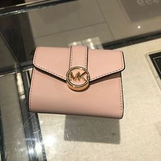 Find ideas๏ฟฝand inspiration for Michael Kors Women's Wallet Carmen Medium Flap bifold in Powder Blush, Womens Accessories Classic Pink Compact Wallet, Classic Compact Pink Wallet, Michael Kors Luxury Bifold Wallet, Michael Kors Bifold Wallet With Card Slots, Elegant Pink Michael Kors Wallet, Powder Blush, Michael Kors Wallet, Signature Design, Wallets For Women