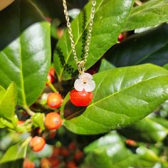 Our cute apple necklace are made with glass apples, acrylic flowers, acrylic leaves and 14k gold plated necklace which are good for delicate ears. We have matching glass apple earrings.Size: the pendant size is about 0.6" wide and 1" long the length is about 18" with 1" extension chain Dainty Red Flower Necklace, Cute Red Flower Jewelry, Cute Cherry Dangle Jewelry, Cute Cherry-colored Jewelry For Gifts, Cute Cherry-colored Jewelry Gift, Elegant Cherry Colored Necklace For Gift, Elegant Cherry Color Necklace For Gift, Red Round Jewelry With Flower Charm, Red Flower Charm Jewelry For Valentine's Day