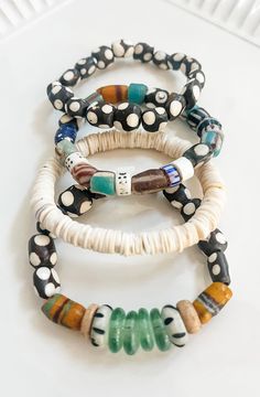 African Trade Beads- recycled glass/brass and wood. Body Candy Jewelry, Leather Techniques, African Trade Bead Jewelry, Accessories Idea, African Beaded Bracelets, African Bracelet, Jewelry Video, Boho Bracelets Stack, Stacked Beaded Bracelets