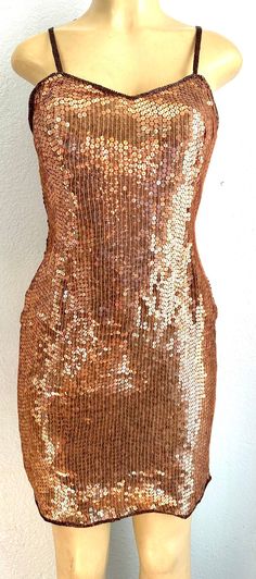 This elegant sequined dress is hand beaded to perfection with sequins and beads all around.  This is for sure an elegant dress for special events, weddings, parties, anniversaries, romantic dinners, red carpets, etc Glamorous Embellished Sequin Dress For Party Season, Glamorous Sequin Prom Dress For Festive Occasions, Holiday Prom Sequin Embellished Dress, Glamorous Embellished Sequin Fabric For Prom, Embellished Sequin Dress For Prom And Holiday, Festive Sequin Prom Dress, Sleeveless Sequin Glitter Wedding Dress, Festive Glamorous Glitter Sequin Dress, Elegant Sequin Fabric For Party