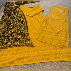 Brand New Chikankari Suit With Sequins And Phulkari Dupatta Length Of Shirt 49 Chest 39 Length Of Palazzo 37 Mustard Yellow Color Approx Measurements Designer Yellow Palazzo Set With Chikankari Embroidery, Designer Yellow Chikankari Embroidery Palazzo Set, Yellow Chikankari Embroidered Palazzo Set, Festive Yellow Chikankari Palazzo Set, Festive Yellow Palazzo Set With Chikankari Embroidery, Fitted Yellow Georgette Palazzo Set, Yellow Sets With Chikankari Embroidery In Traditional Drape, Yellow Salwar Kameez With Chikankari Embroidery, Yellow Palazzo Set With Dabka For Navratri