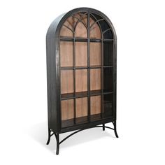 an old fashioned black bookcase with glass doors on the top and bottom, against a white background