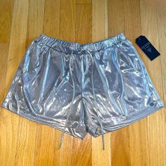 Brand New With Tags, Guess Shiny Shorts, With Waistband And Tie And Pockets. Size Small, Very Stretchy And Comfortable Shorts. Casual Metallic Bottoms With Pockets, Casual Metallic Bottoms With Elastic Waistband, Casual Party Shorts With Pockets, Casual Metallic Shorts, Metallic Short Bottoms For Summer, Casual Metallic Shorts For Night Out, Casual Metallic Finish Shorts For Night Out, Casual Shorts With Pockets For Party, Casual Metallic Shorts For Spring