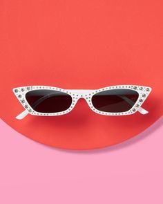 "✨Glitz and Glam: Our retro inspired skinny cat eye white lenses with rhinestones are the coolest party or costume accessory you've been looking for! ✨Bling Bling: These trendy sunglasses are designed with rhinestone details, some big, some small! ✨The Perfect Size: each sunglass measures 6\" wide - fiits every face shape and size :) ✨Eye Candy: made with a durable plastic frame + a metal hinge so you can strike a pose all weekend long! ✨Cute Stuff Inside: and outside, too! Each order comes pack Y2k Halloween Costume, Y2k Birthday Party, White Bachelorette, Y2k Halloween, White Lenses, Sunglasses White, Rhinestone Sunglasses, Party Sunglasses, Cute Sunglasses