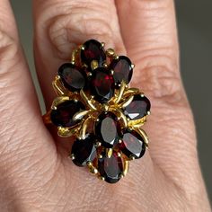 This Is An Absolutely Gorgeous Natural / Genuine Cherry Red Garnet Cluster Gold Plated Sterling Silver Ring. The Cluster Consists Of 10 Oval Brilliant Cut Garnet Gems Stones, That Are 7mm X 5.5mm X 5mm In Dimensions, Making Each Stone Over 1.5 Carats (15 Carat Total Weight). The Ring Mount Is Made Of Gold Plated Sterling Silver. Stamped 925 On Its Shank. A Size 8 And In Unused Vintage Condition. Garnet Ring Vintage Square, Luxury Garnet Jewelry, Rhodalite Garnet Jewelry, Natural Garnet Jewelry, Luxury Garnet Cluster Ring For Engagement, Gernet Ring, Most Expensive Jewelry, Intricate Jewelry, Vintage Jewelry Antique