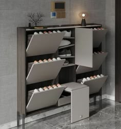 an italian light luxury ultra - thin shoe cabinet with foldable shoe stools in grey