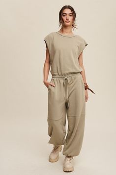 Introducing our Athleisure French Terry Loose Tee Jogger Pants Jumpsuit, a perfect blend of comfort and style for your active lifestyle. Crafted from soft French terry fabric, this jumpsuit offers a relaxed fit and ultimate comfort. - Model is 5' 7" 31-24-35 and wearing a size SmallMeasurement from a small:Bust: 20.5"Waist: 15"Hips: 22.5"Inseam: 26"Length: 55.5"Made in China Style: Casual Print / Pattern: Plain Silhouette: Jumpsuit Fit: Regular Embellishment: Open Back Neck Line: Round Sleeve: O Athleisure French Terry Sweats In Relaxed Fit, French Terry Athleisure Sweats For Everyday, Sporty French Terry Sweats With Relaxed Fit, Comfortable French Terry Sweats For Loungewear, Relaxed Fit French Terry Sweats For Loungewear, Jumpsuit Fitted, Loose Tees, French Terry Fabric, Athleisure Fashion