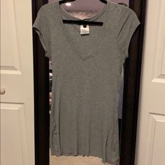 Grey Ribbed Tee. Never Worn Gray Ribbed V-neck Top, Gray Ribbed Top For Loungewear, Gray Ribbed Loungewear Tops, Gray V-neck Top For Loungewear, Gray V-neck Loungewear Top, Ribbed Tee, V Neck Tee, Heather Grey, Heathers