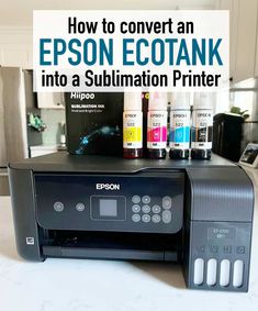 an epson printer sitting on top of a counter with ink in it and the words how to convert an epson ecotank into a sublimation printer