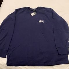 Brand New Stussy Ls Navy Blue Size M Blue Shirt For Streetwear In Fall, Casual Long Sleeve Blue T-shirt, Casual Blue Long Sleeve T-shirt, Navy Cotton Long Sleeve Tops, Navy Long Sleeve Shirt With Relaxed Fit, Blue Long Sleeve T-shirt, Navy Blue Stussy Hoodie, Stussy 8 Ball Tshirt, Blue Cotton Long Sleeve T-shirt