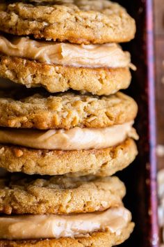 a stack of cookies with frosting on top