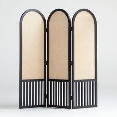 three panel screen with woven panels and black frame