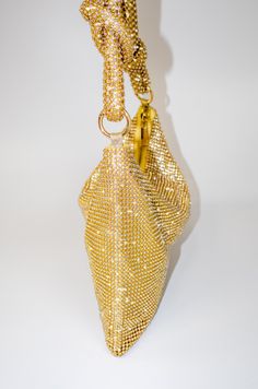 Capture the light with the dazzling Precious Adornments Gold-Tone Top Handle Bag. This fully embellished treasure will turn heads with its mesmerizing golden hues and sparkling accent beads. With a secure zipper closure and full interior lining, it is the ultimate accessory for any outfit! Measurements Bag Measurement: 11"L X 2"W X 6"H Handle Measurement: 17" Product Details Embellished All Around Fully Embellished Handle Zipper Closure Full Interior Lining Flash Photography & Editing Have Been Embellished Top, Some Times, Flash Photography, Photography Editing, Handle Bag, Top Handle, Sale Items, Top Handle Bag, Gold Tones