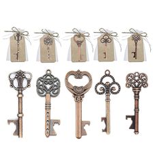 six antique keys tied with twine and string, all in different shapes and sizes