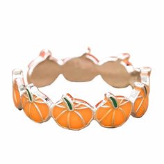 an orange ring with four small pumpkins on it